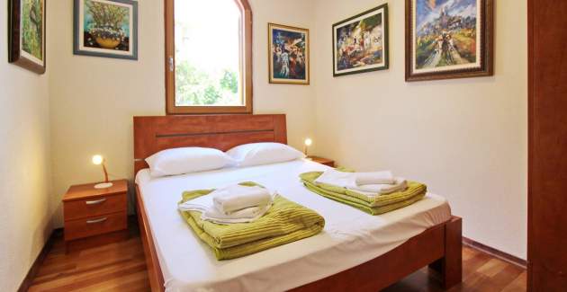 Appartamento Mrkus A6 priz - con terrazza, vicino alla spiaggia