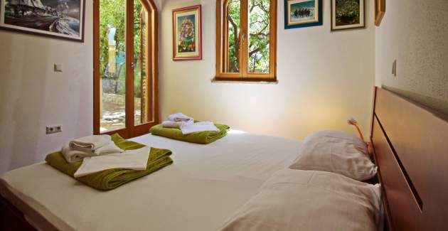 Appartamento Mrkus A6 priz - con terrazza, vicino alla spiaggia