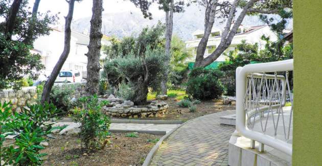 Appartamento Mrkus A6 priz - con terrazza, vicino alla spiaggia