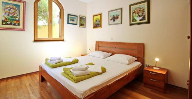 Appartamento Mrkus A6 priz - con terrazza, vicino alla spiaggia