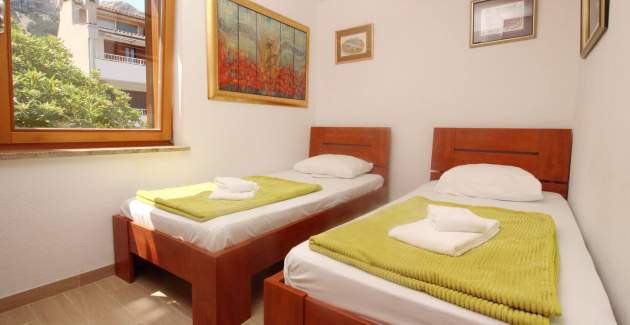 Appartamento Mrkus brdo - con balcone, vicino alla spiaggia